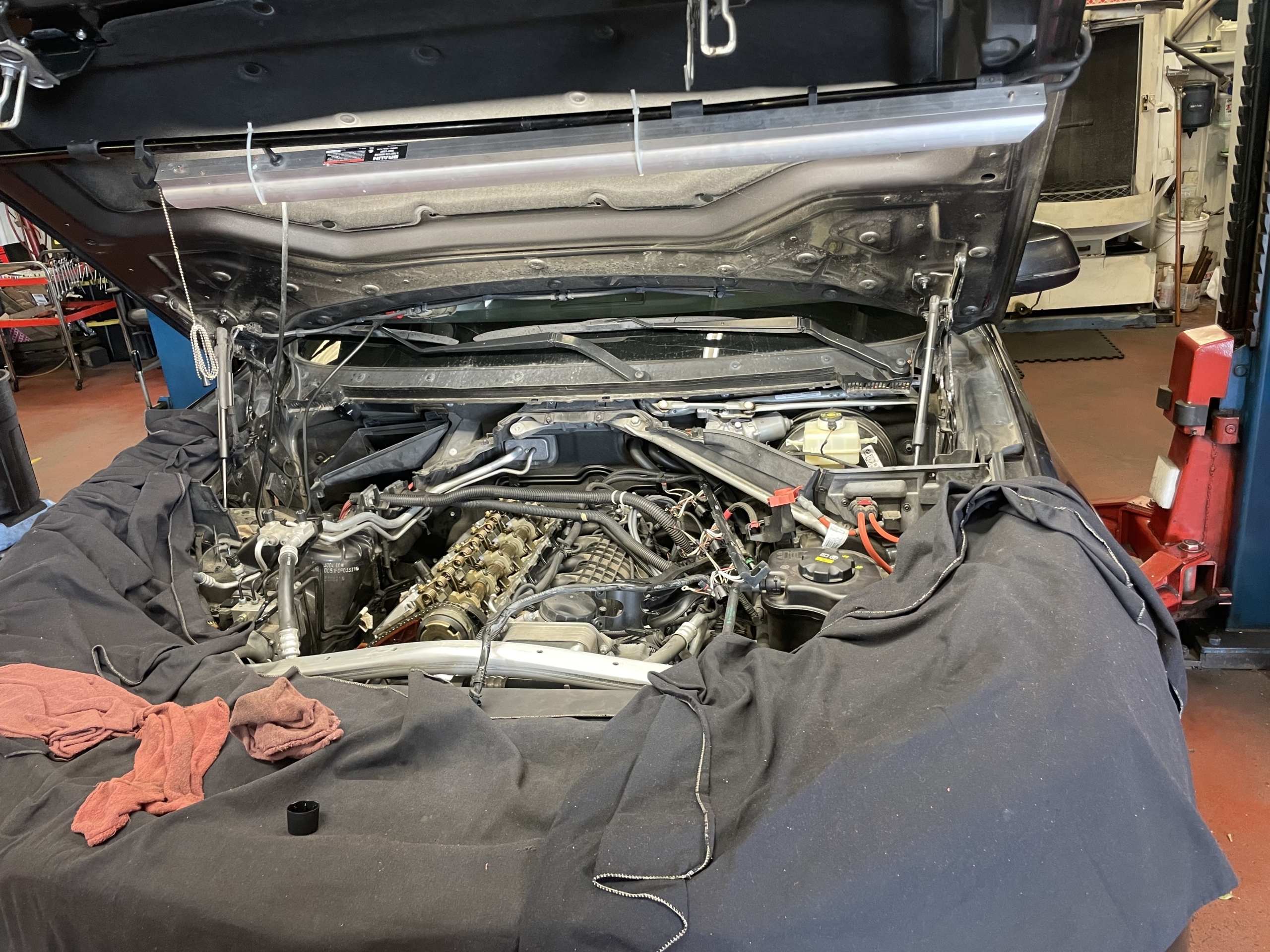 Complex European Engine Diagnosis and Repair European vehicle engine opened for complex mechanical diagnosis and repair